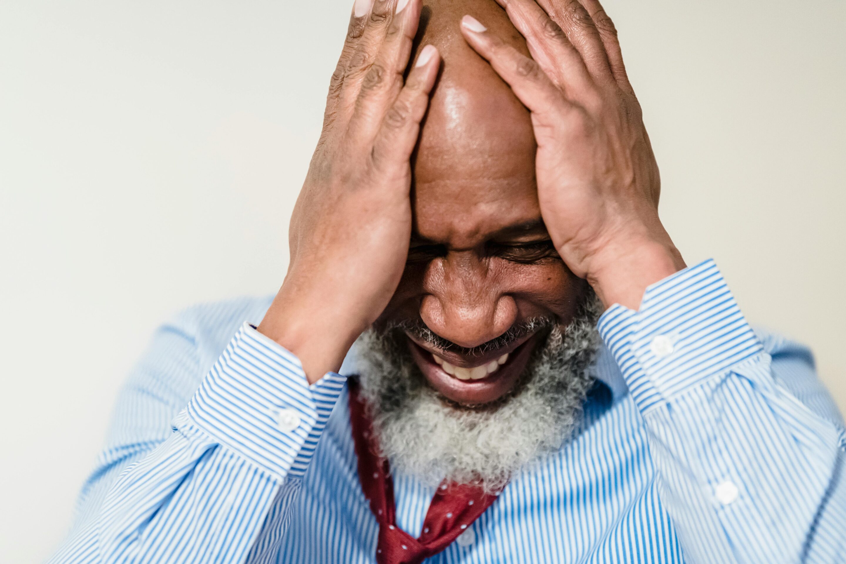 Man overwhelmed by stress and anxiety Man overwhelmed by stress and anxiety