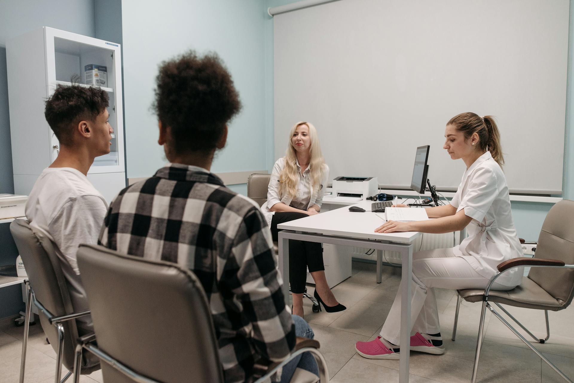 Healthcare consultation – doctor and patients